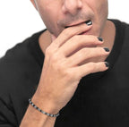 Bracciale con rondelle in pietra ed elementi in ematite