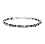 Bracciale con rondelle in pietra ed elementi in ematite